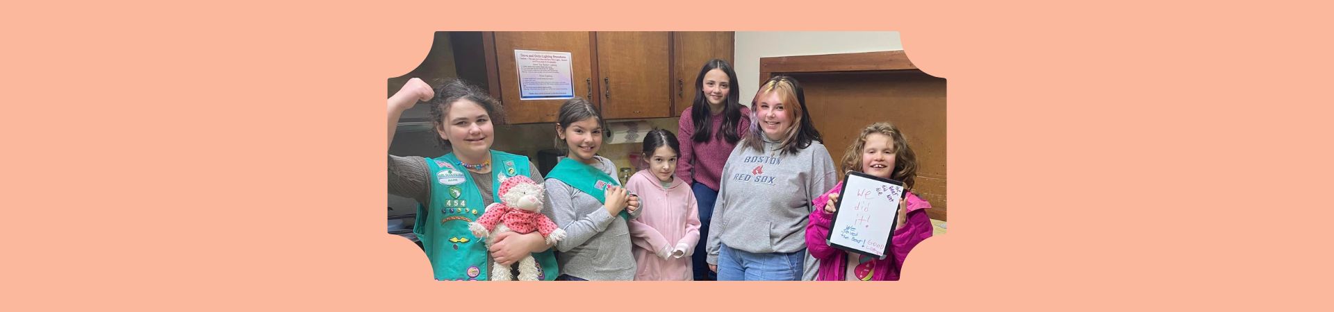  Six girl Scouts from troop 454 in a kitch after finishing escape room 