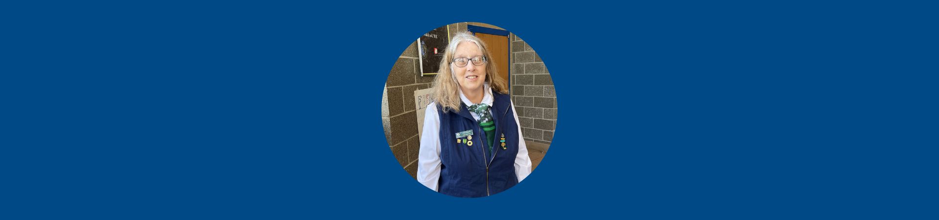  Laurie McBurnie smiling while wearing her adult vest 