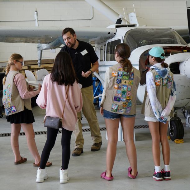 girls learning about model vs plane