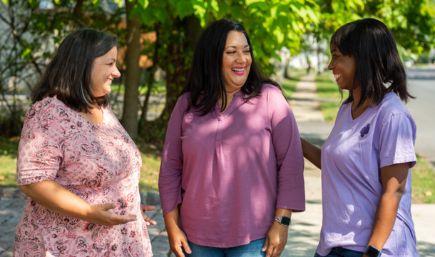 group of three volunteers
