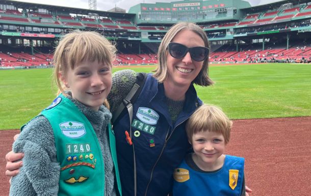 girl scouts and adult volunteer at fenway