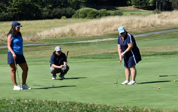 golfers on the green