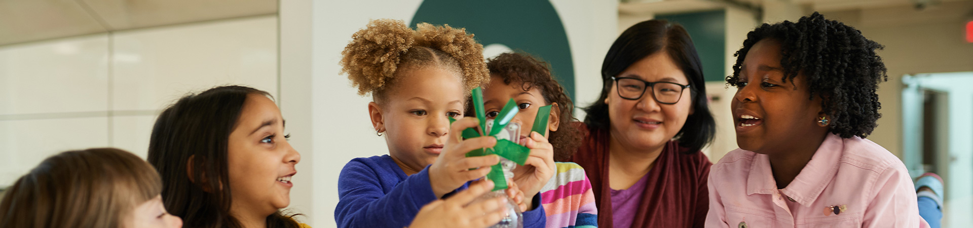  group of girls working on a STEM windmill 