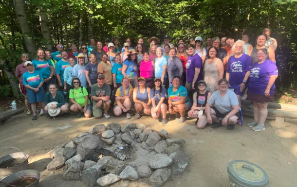 group of alums outside at camp