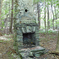 outdoor fireplace at camp kirkwold