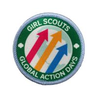 Image of Global Action Days patch with a globe in the middle and 3 colorful arrows rising up to the right
