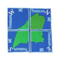 Four patches pieced together to create the shape of maine with north, south, east, and west